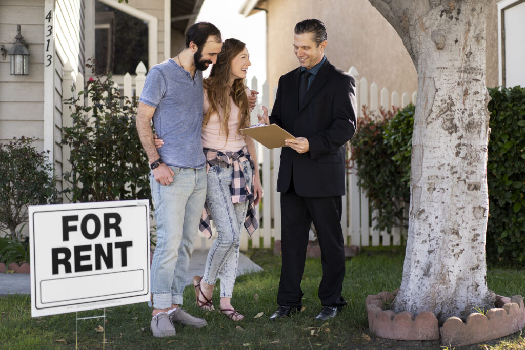 Luton’s Property Experts: Why Choosing the Right Estate Agent in Luton or Letting Agent in Luton Matters 1 couple signing papers fr new house 1